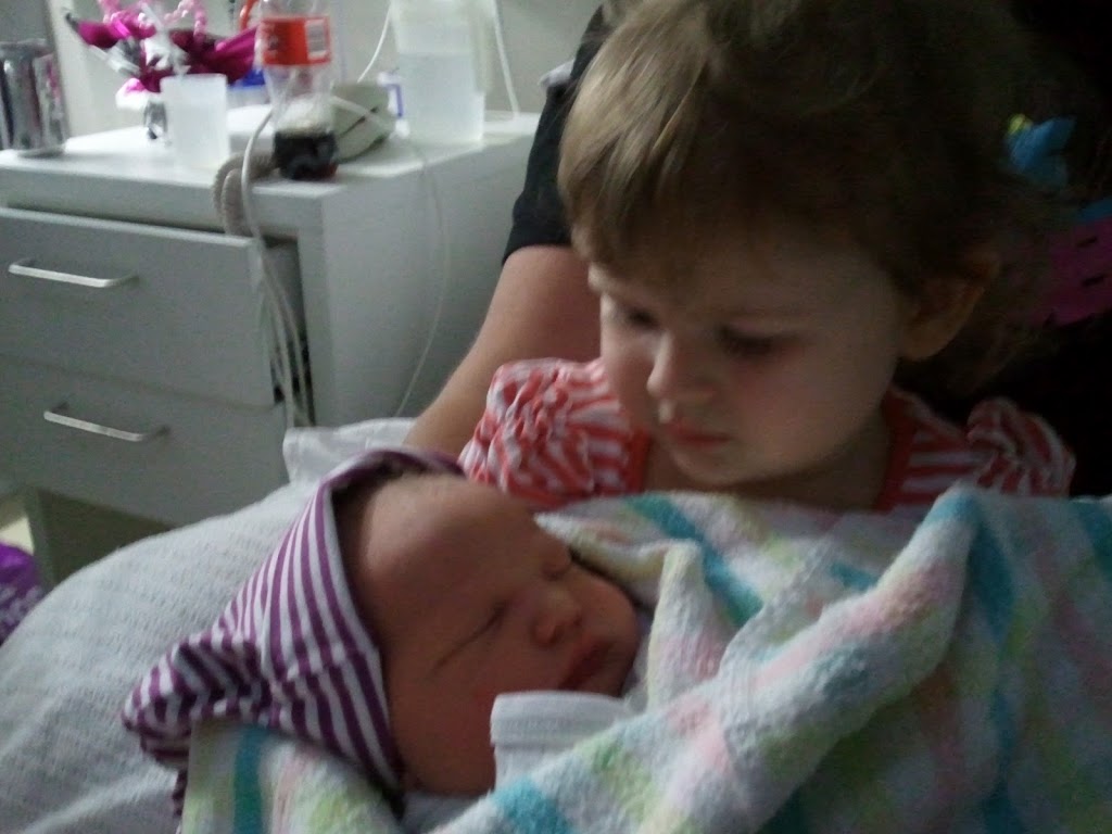Hello Caitlin as First Grandaughter meets Cousin for first time.